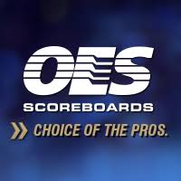 A logo on a blue gradient background featuring the large stylized letters OES with horizontal cutouts, the word SCOREBOARDS below it, and the slogan CHOICE OF THE PROS at the bottom with a double gold arrow icon.